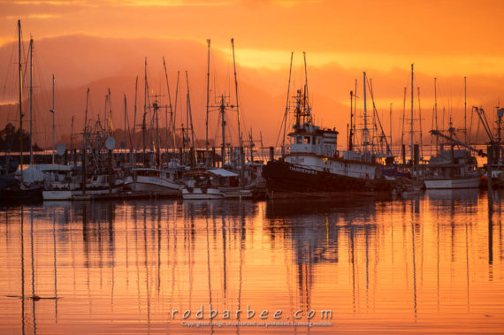 Sun setting behind Eliason Harbor, Sitka, Alaska